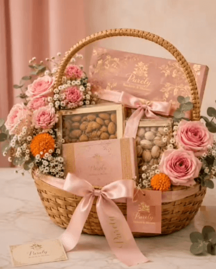 Celebration gift basket with flowers and sweets